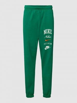 Spodnie sportowe z nadrukiem Nike zielone