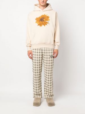 Kapučdžemperis ar ziediem ar apdruku Pleasures bēšs