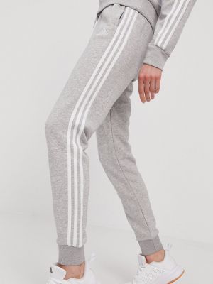 Kalhoty s aplikacemi Adidas šedé