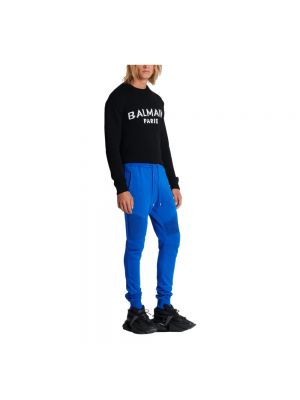 Spodnie sportowe z nadrukiem Balmain niebieskie
