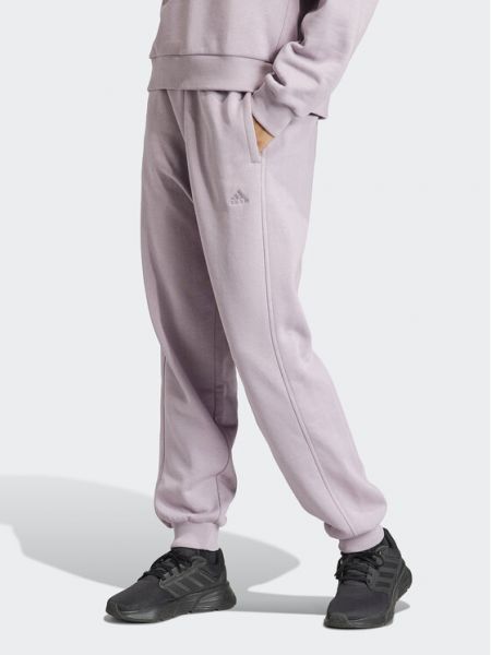 Voľné priliehavé teplákové nohavice Adidas fialová