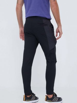 Sportovní kalhoty s aplikacemi Adidas černé