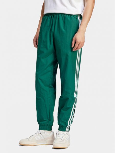 Pletené priliehavé teplákové nohavice Adidas zelená