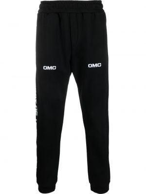 Pantaloni con stampa Omc nero