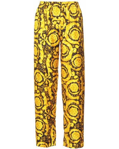 Pantaloni de mătase cu imagine Versace auriu