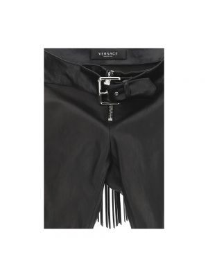 Pantalones con flecos de cuero Versace negro