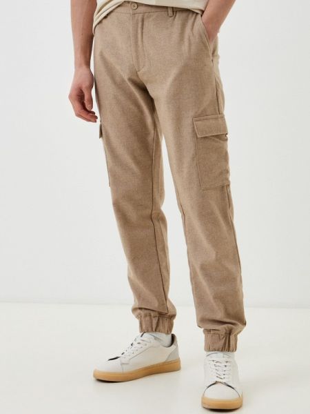 Бежевые брюки карго Lacoste