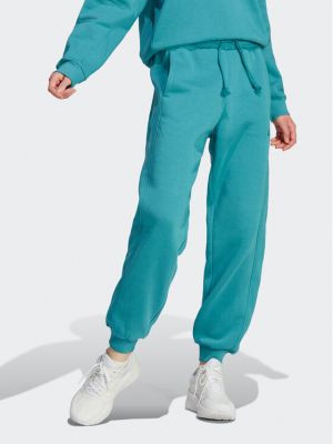 Pantaloni sport din fleece cu croială lejeră Adidas albastru