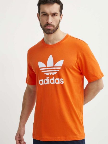 Bavlněné tričko s potiskem Adidas oranžové