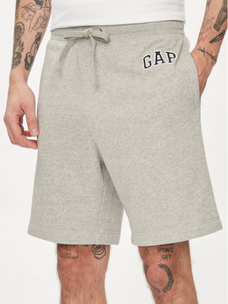 Priliehavé športové šortky Gap sivá