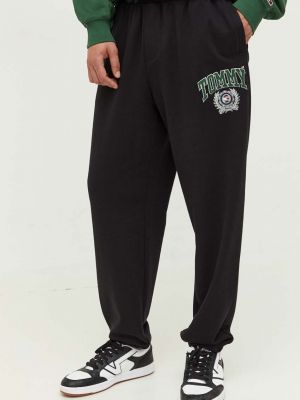 Spodnie sportowe bawełniane Tommy Jeans czarne