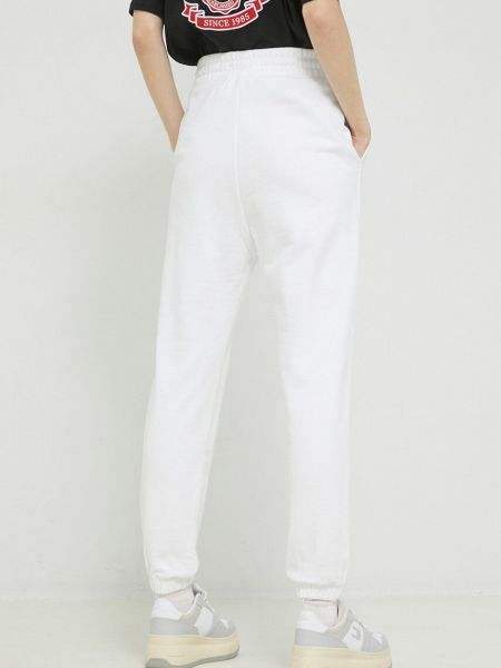 Pantaloni sport cu croială lejeră Tommy Jeans alb