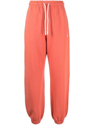 Bavlněné sportovní kalhoty s výšivkou Marcelo Burlon County Of Milan oranžové