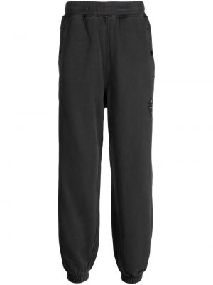 Pantalon de joggings avec applique Izzue gris