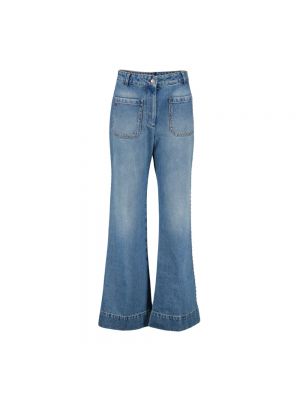 Rozkloszowane spodnie Victoria Beckham niebieskie