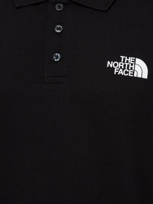 Medvilninis polo marškinėliai The North Face juoda