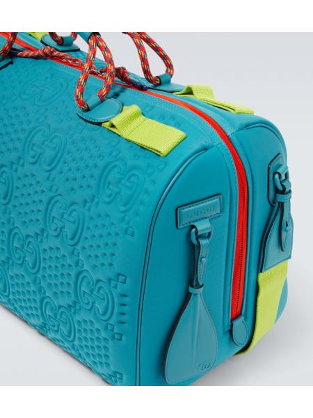 Usnjena crossbody torbica Gucci modra