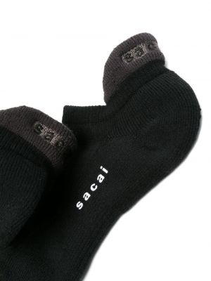 Siuvinėtos kojines Sacai