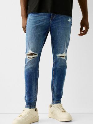 Каковы особенности мужских рваных джинсов, с чем сочетаются