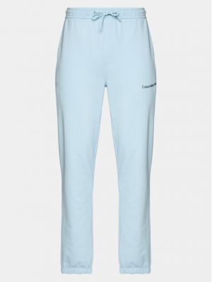 Priliehavé teplákové nohavice Calvin Klein Jeans modrá
