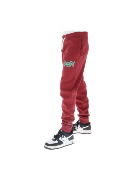Spodnie sportowe Superdry czerwone