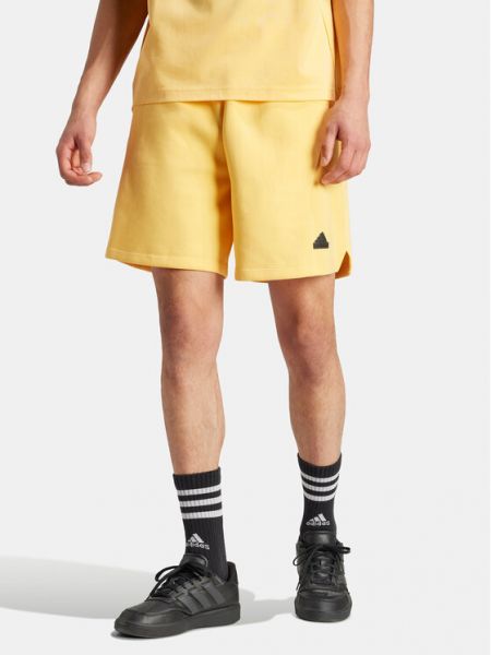 Voľné priliehavé športové šortky Adidas oranžová