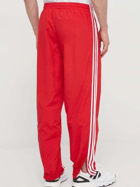 Pletené sportovní kalhoty s aplikacemi Adidas Originals červené