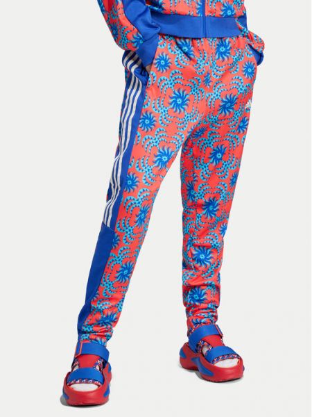 Spodnie sportowe z nadrukiem Adidas Sportswear niebieskie