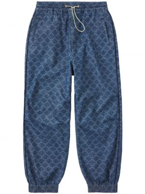 Teplákové nohavice s potlačou Closed modrá