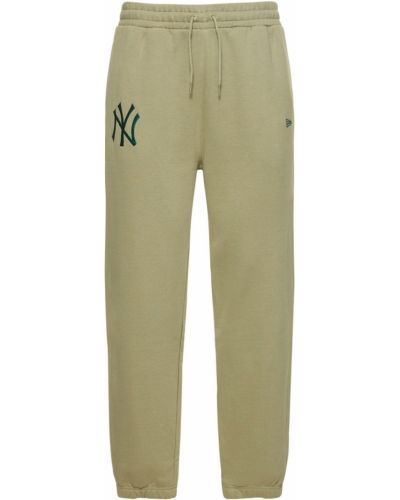 Памучни панталони jogger от джърси New Era зелено