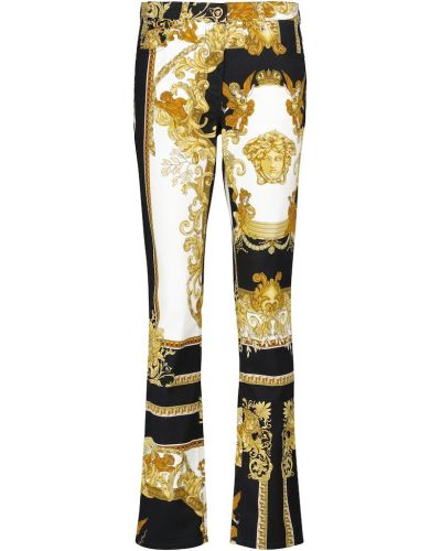 Jeans a zampa Versace, oro