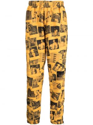 Pantalones de chándal con estampado Lacoste amarillo