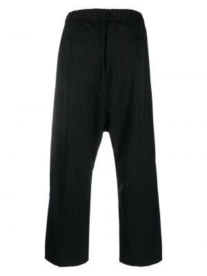 Spodnie w paski z nadrukiem Attachment czarne