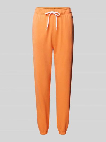 Spodnie sportowe bawełniane Polo Ralph Lauren pomarańczowe