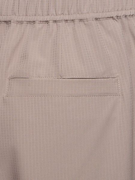 Pantalones plisados Varley