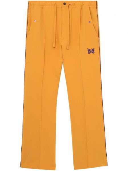 Спортни панталони на райета Needles жълто