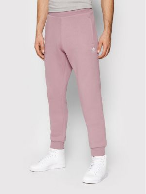 Slim fit priliehavé teplákové nohavice Adidas fialová