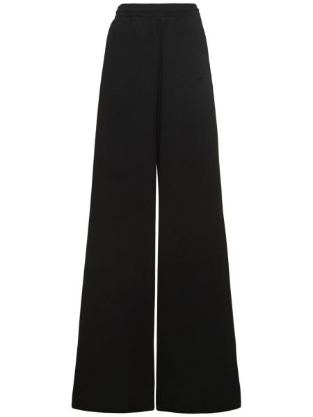 Voľné teplákové nohavice s potlačou Vetements čierna
