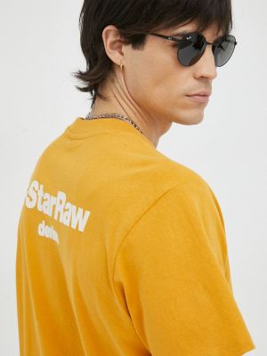 Bavlněné tričko s aplikacemi s hvězdami G-star Raw oranžové