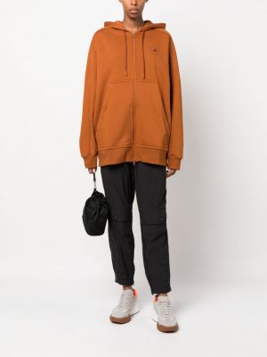 Kapučdžemperis ar rāvējslēdzēju ar apdruku Adidas By Stella Mccartney oranžs