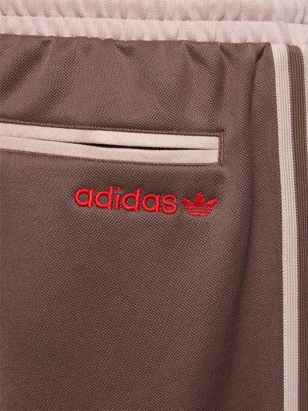 Spodnie bawełniane Adidas Originals brązowe