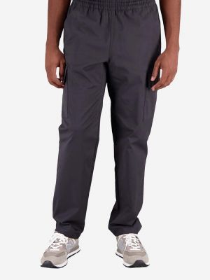 Jednobarevné kalhoty New Balance šedé