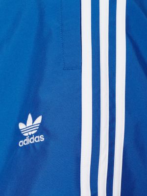 Pruhované kraťasy Adidas Originals modré