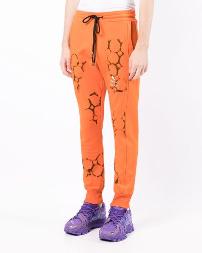 Sportovní kalhoty s potiskem Mauna Kea oranžové