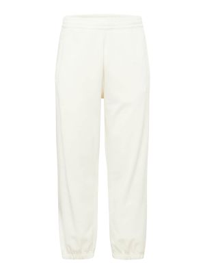 Jednofarebné bavlnené teplákové nohavice Carhartt Wip - biela