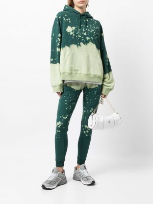 Sportovní kalhoty s potiskem s abstraktním vzorem La Detresse zelené