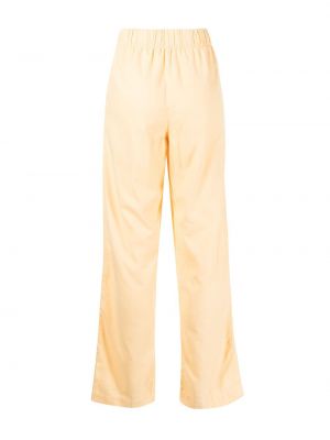 Flanelové kalhoty Tekla žluté
