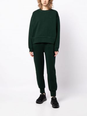 Pantalon de joggings en coton à imprimé Lacoste vert