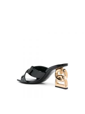 Mules chapados en oro Dolce & Gabbana negro