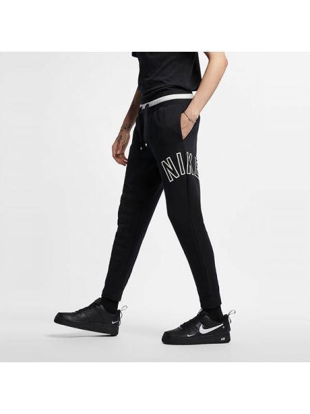 Повседневные флисовые брюки скинни слим Nike черные